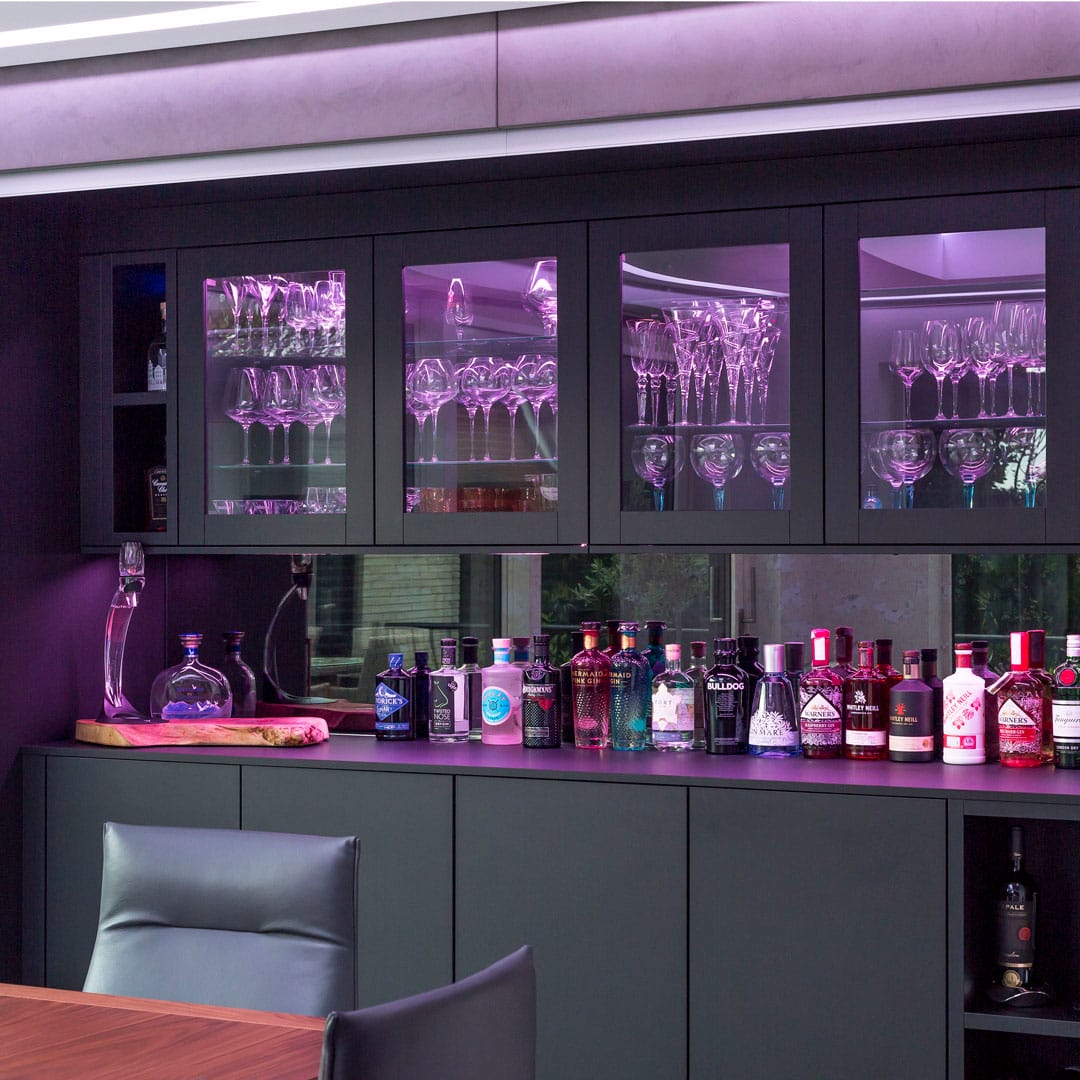 Drayton Lane purple lit glass cupboard - Hubble Kitchens